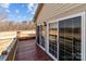 Relaxing outdoor deck provides a view of the landscaped backyard with mature trees at 515 Panhandle Rd, Gold Hill, NC 28071