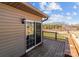 Outdoor deck boasts scenic backyard views, seamlessly connecting indoor and outdoor living at 515 Panhandle Rd, Gold Hill, NC 28071