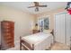 Cozy bedroom featuring a bed, dresser, and natural light at 5213 Wood Lake Dr, Belmont, NC 28012