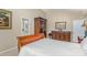 Well-lit bedroom featuring a dresser and closet space at 5213 Wood Lake Dr, Belmont, NC 28012