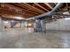 Unfinished basement with exposed beams and utilities, ready for customization and finishing touches at 5830 W Nc 10 Hwy, Hickory, NC 28602