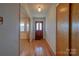 Inviting foyer featuring hardwood floors and a beautifully crafted front door at 5830 W Nc 10 Hwy, Hickory, NC 28602