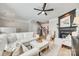 Spacious living room with fireplace, cozy furniture, neutral tones, and ample natural light at 663 Sixth Baxter Xing, Fort Mill, SC 29708