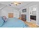 Cozy bedroom with hardwood flooring, a view of the en suite bathroom, and neutral tones at 664 Bluff Loop Rd # 202, Rock Hill, SC 29730