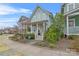 Inviting two-story home features a quaint front porch, manicured landscaping, and a welcoming entrance at 664 Bluff Loop Rd # 202, Rock Hill, SC 29730