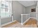 Bright hallway with natural light and hardwood floors at 664 Bluff Loop Rd # 202, Rock Hill, SC 29730