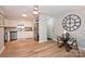 Modern kitchen featuring stainless steel appliances, and adjacent dining area at 7101 Quail Meadow Ln, Charlotte, NC 28210