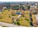 An aerial view highlights the beautiful property on a sunny day at 723 W Zion Church Rd, Shelby, NC 28150