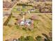 Aerial view of the estate featuring a large grassy yard and mature trees at 723 W Zion Church Rd, Shelby, NC 28150