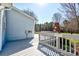 View of the back porch and yard showcasing a brick fireplace and surrounding landscape at 723 W Zion Church Rd, Shelby, NC 28150