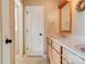 This bathroom features a double vanity, framed mirror, and neutral walls with light flooring at 723 W Zion Church Rd, Shelby, NC 28150