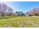 Inviting home with a well-manicured lawn and a charming front porch, perfect for relaxing and enjoying the outdoors at 723 W Zion Church Rd, Shelby, NC 28150