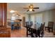 Spacious kitchen and dining area featuring tile flooring, a center island, stainless steel appliances, and plenty of natural light at 723 W Zion Church Rd, Shelby, NC 28150