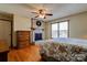 Main bedroom with hardwood floors, fireplace, and natural light at 723 W Zion Church Rd, Shelby, NC 28150