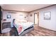 The owner's bedroom is nicely decorated and features wood-look floors at 80 Sunset Dr, Taylorsville, NC 28681