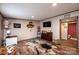 Cozy bedroom with hardwood floors, decorative touches, and an ensuite bathroom at 80 Sunset Dr, Taylorsville, NC 28681