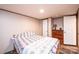 Cozy bedroom featuring neutral walls, wood-look floors, and a comfortable bed at 80 Sunset Dr, Taylorsville, NC 28681