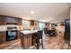 Well-lit kitchen boasts ample counter space, modern appliances, and a cozy dining area at 80 Sunset Dr, Taylorsville, NC 28681