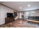 A cozy living room featuring wood-look floors and comfortable seating at 80 Sunset Dr, Taylorsville, NC 28681