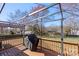 Cozy back deck with grill, offering a perfect spot for outdoor relaxation and entertaining at 8009 Idlewild Rd, Indian Trail, NC 28079