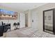 Comfortable bedroom featuring neutral paint, wood-look floors and a tv at 8009 Idlewild Rd, Indian Trail, NC 28079