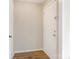 Clean entryway with durable wood-look flooring and white walls, welcoming guests at 8101 Coxwood Ct, Charlotte, NC 28227