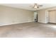 Generously sized living room offering a flexible layout and access to other rooms at 8101 Coxwood Ct, Charlotte, NC 28227