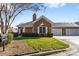 Charming brick home featuring a well-kept lawn, attached garage, and a traditional design at 8328 Highland Glen Dr, Charlotte, NC 28269