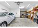 Organized garage with ample storage space, shelving, and a clean, well-lit interior at 8328 Highland Glen Dr, Charlotte, NC 28269