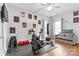 Bright home gym featuring modern exercise equipment, neutral walls, and wood floors for an inspiring workout space at 8328 Highland Glen Dr, Charlotte, NC 28269