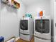 Functional laundry room with modern washer and dryer for efficient laundry care at 8328 Highland Glen Dr, Charlotte, NC 28269