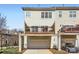 Exterior elevation featuring wood deck and attached garages at 8436 Summerford Dr, Charlotte, NC 28269