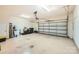 A spacious two car garage with neutral walls and sealed concrete floors at 8436 Summerford Dr, Charlotte, NC 28269