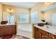 Inviting main bathroom with double sinks, a soaking tub, and plenty of counter space at 8436 Summerford Dr, Charlotte, NC 28269