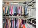 Well-organized walk-in closet with ample shelving and hanging space for clothing and accessories at 8436 Summerford Dr, Charlotte, NC 28269