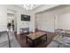 Open-concept living area with recessed lighting, dark hardwood floors, and light walls at 966 Parkland Nw Pl, Concord, NC 28027