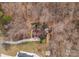 Overhead aerial shot displays the house layout, surrounding landscape, and outdoor living spaces at 109 Hawksnest Ln, Mooresville, NC 28117