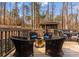 Backyard deck with a seating area around the firepit and a gazebo in the background at 109 Hawksnest Ln, Mooresville, NC 28117