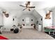 Open bonus room with a ceiling fan, and is perfect for entertaining at 109 Hawksnest Ln, Mooresville, NC 28117