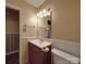 A full bathroom with a vanity, mirror, and toilet, perfect for daily living at 1120 Glenarden Dr, Rock Hill, SC 29730