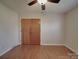 A spacious bedroom with hardwood floors and a closet at 1120 Glenarden Dr, Rock Hill, SC 29730