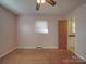 Bright bedroom featuring hardwood floors, a ceiling fan and natural light from a window at 1120 Glenarden Dr, Rock Hill, SC 29730