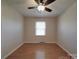 Bright bedroom featuring hardwood floors, a ceiling fan and natural light from a window at 1120 Glenarden Dr, Rock Hill, SC 29730