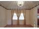 Traditional dining room featuring patterned flooring, wallpaper, and a vintage lighting fixture at 1120 Glenarden Dr, Rock Hill, SC 29730