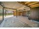 Large garage featuring a concrete floor, lighting, and open walls for a functional space at 127 Barry Oak Rd, Statesville, NC 28625