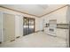 Kitchen with a high ceiling, white cabinets, and a sliding glass door at 127 Barry Oak Rd, Statesville, NC 28625