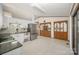 Kitchen featuring tiled floors, white cabinetry, and stainless steel appliances at 127 Barry Oak Rd, Statesville, NC 28625