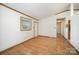 Bright living room showcasing hardwood floors, white walls, and ample natural light, perfect for Gathering gatherings at 127 Barry Oak Rd, Statesville, NC 28625