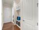 Well-organized mudroom with bench seating, storage cubbies, and easy access to the garage at 12726 Rusty Blackbird Way, Charlotte, NC 28278
