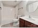 Bathroom featuring a shower-tub combo, wood-look flooring, and a single vanity at 12727 Bullock Greenway Blvd, Charlotte, NC 28277